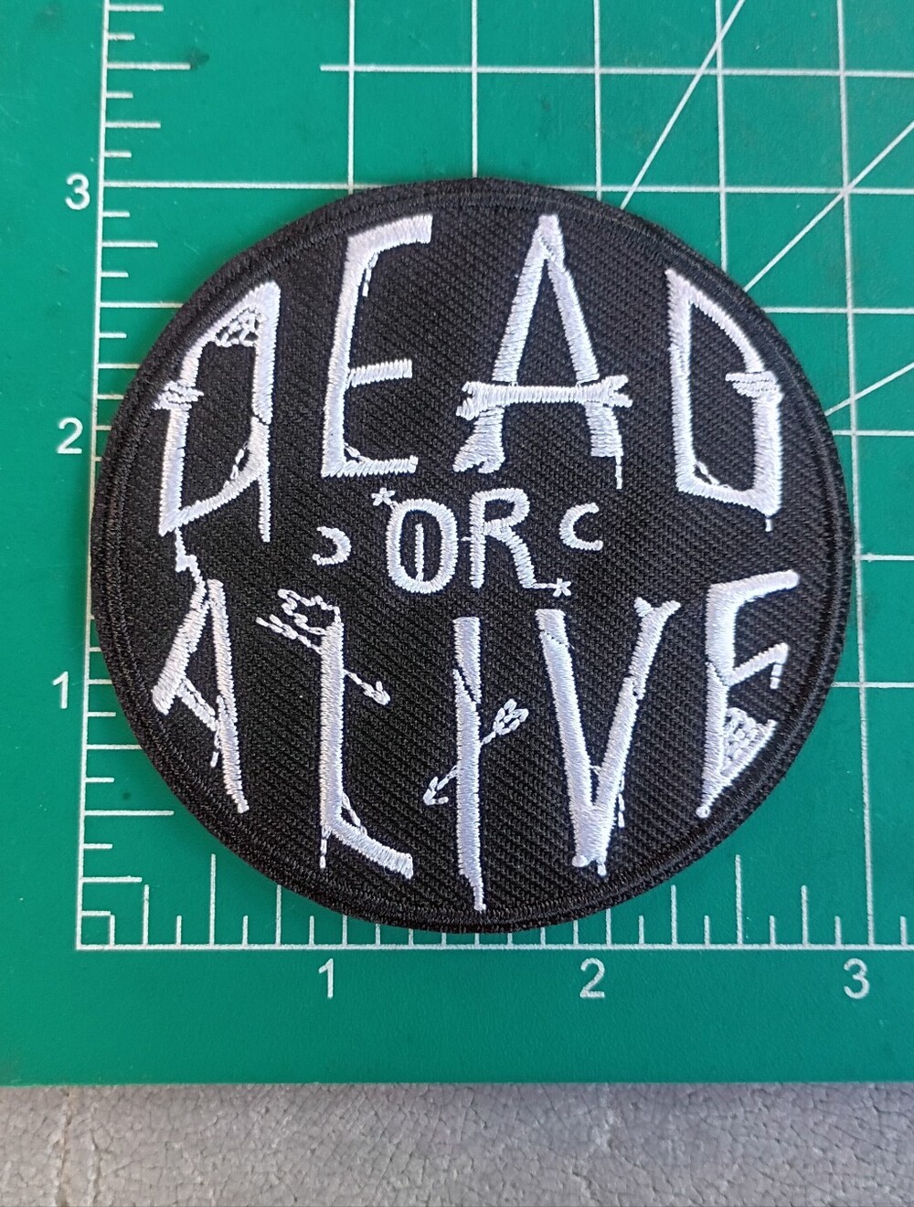 Dead Or Alive Round Grunge Print Iron On Embroidered Patch